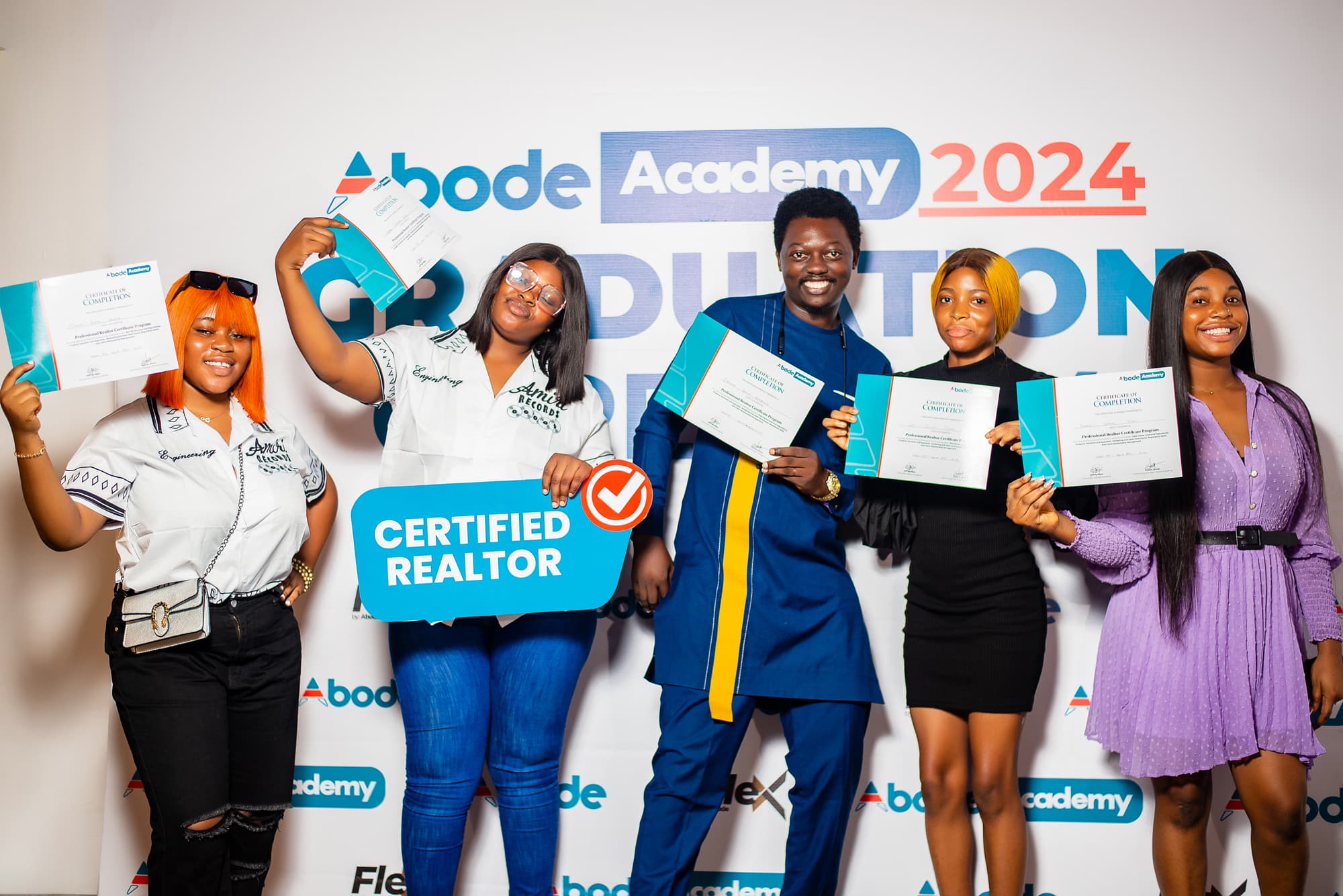 Abode Associates graduates with certificates