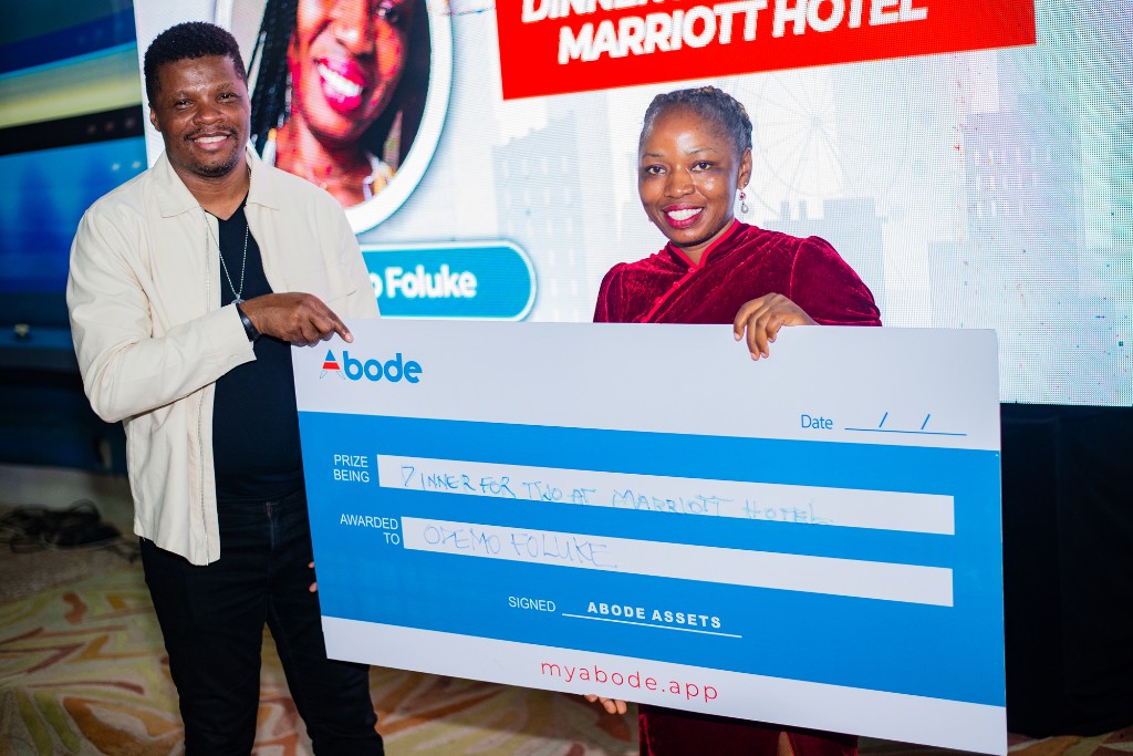 Associate receiving a dinner prize check